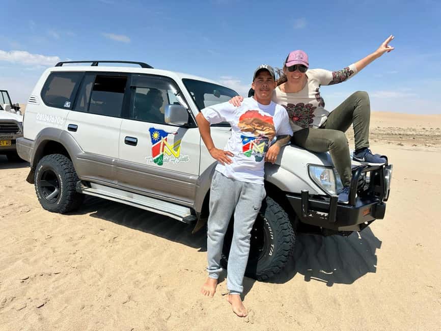 swakopmund city tour dune 7 pink lake pink flamingos - Pink lakes and flamingos bring a softer side to the desert